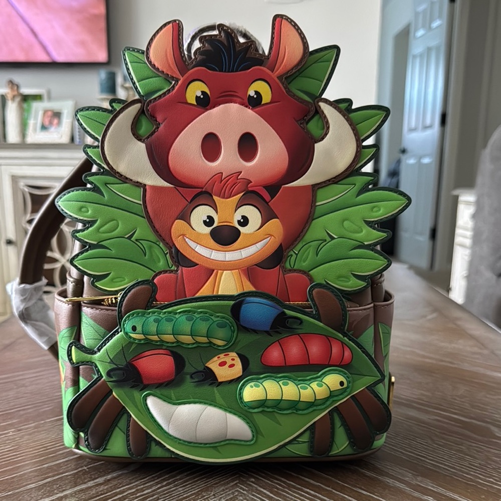 Loungefly Lion-Themed Backpack with Green and Brown Accents